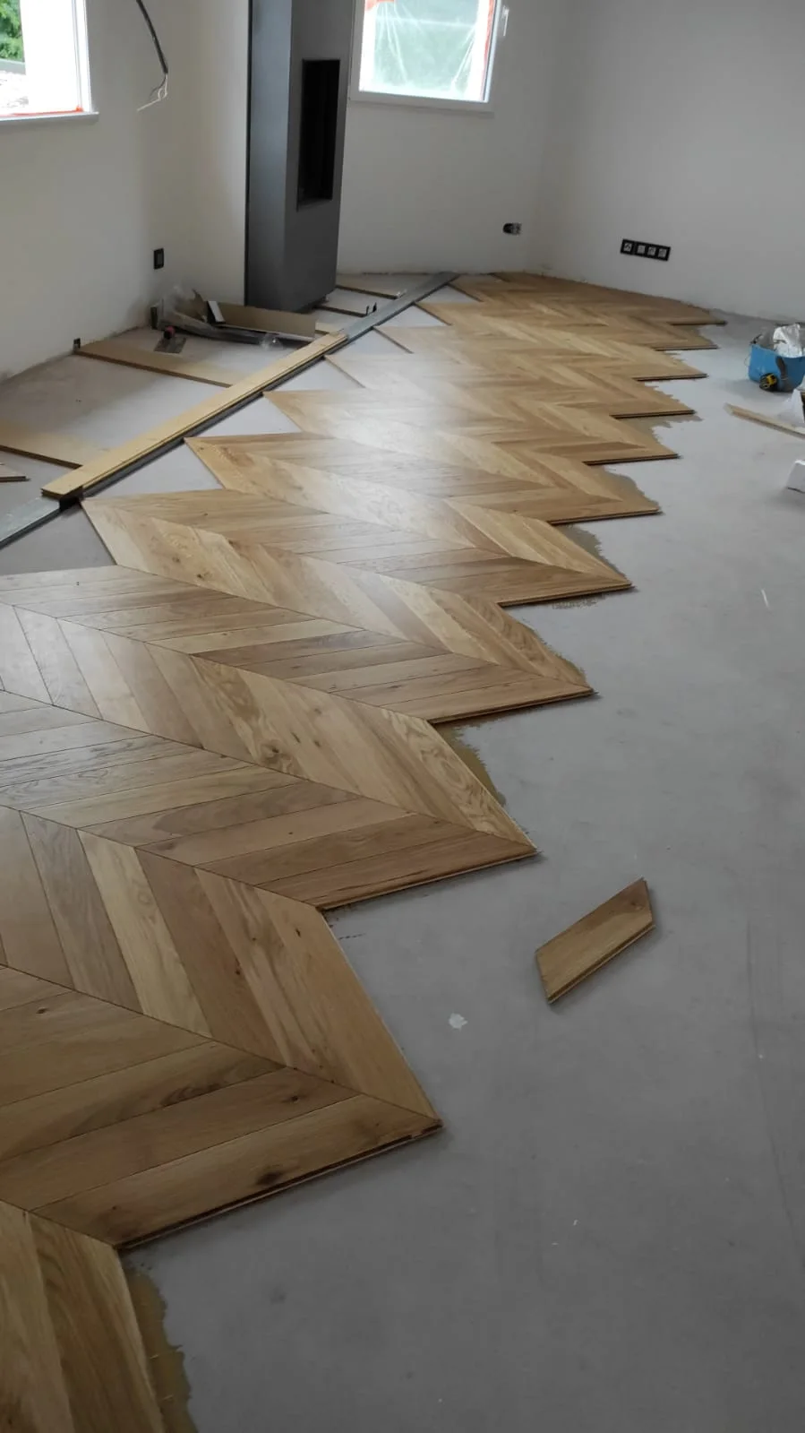 Photographie de la réalisation : Parquet pointe de Hongrie et escalier.