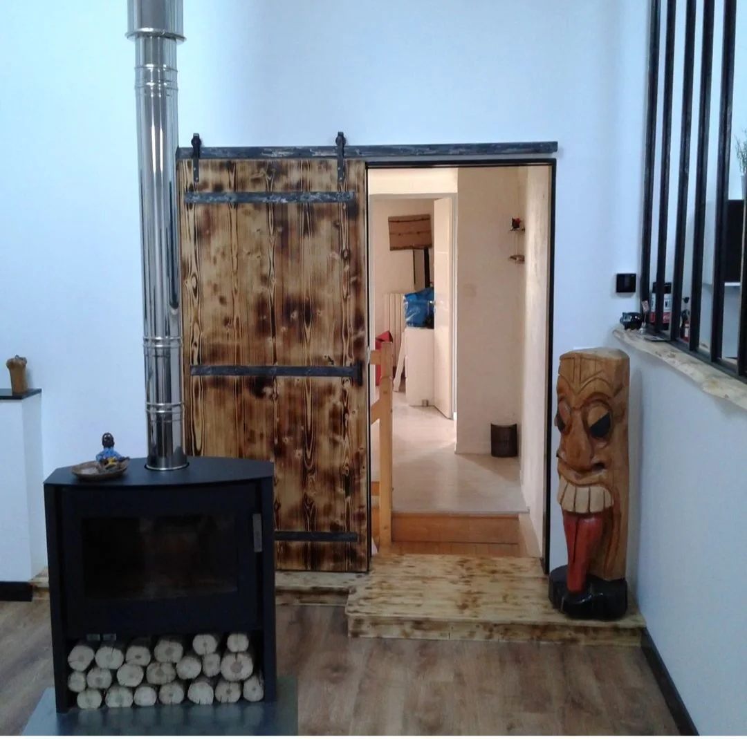 Photographie de la réalisation : Porte coulissante, palier et parquet.